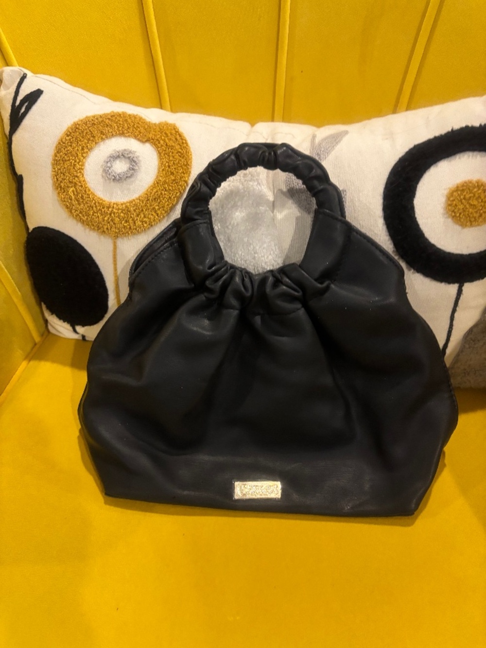 SMALL CUTE PLEATHER BAG BY CARLOS SANTANA